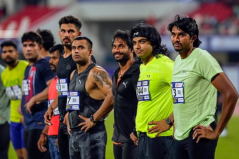 Neeraj Chopra (2R) and Kishore Kumar Jena (3R)